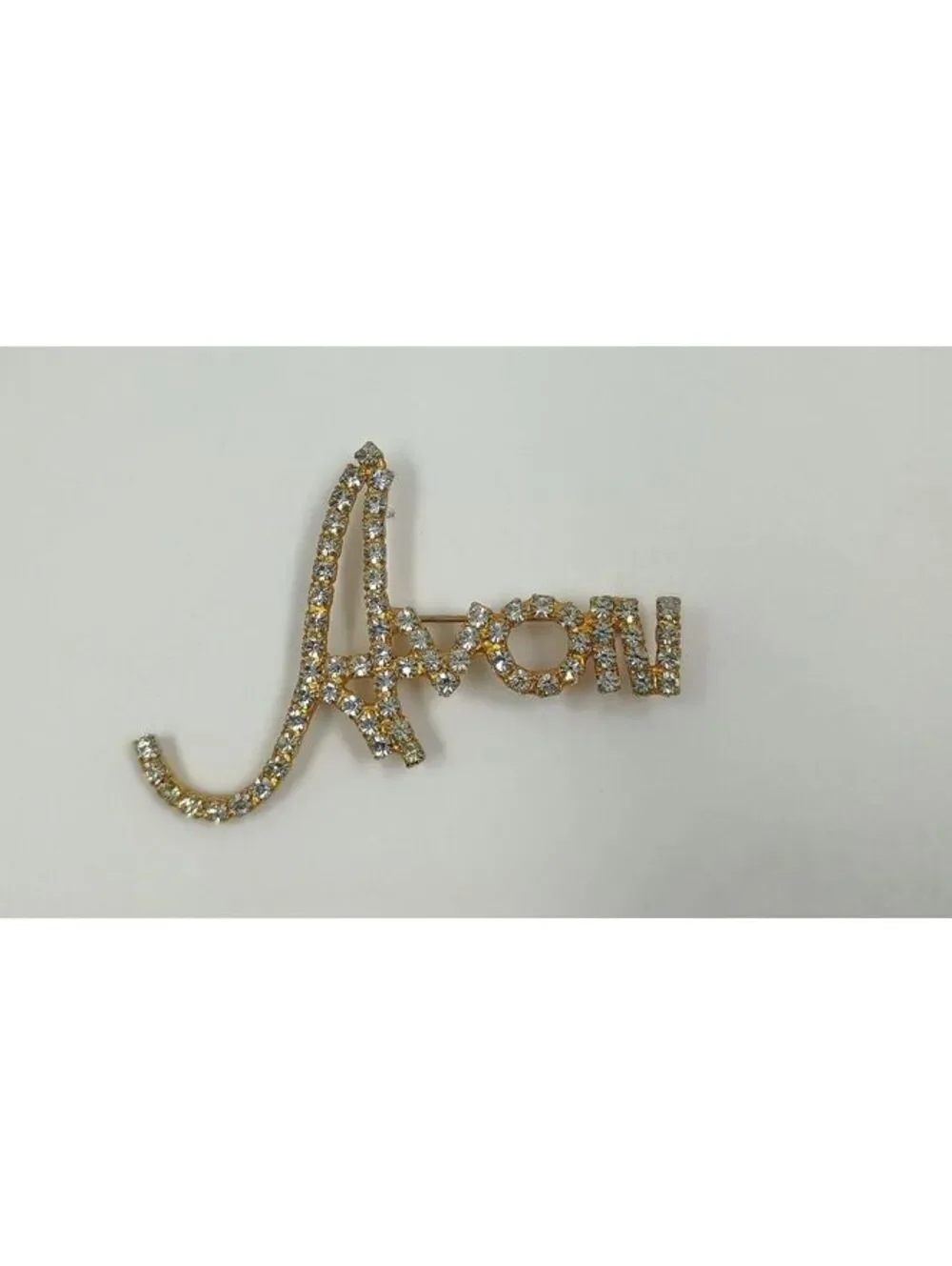 Avon Gold Tone Rhinestone Script Brooch Pin